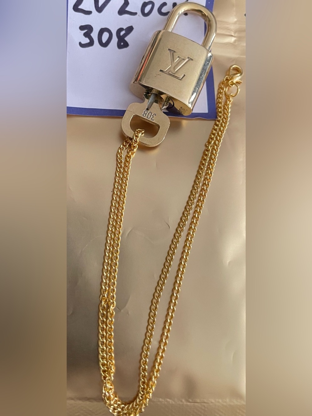 Louis Vuitton Gold Padlock Charm Necklace with Key Accent